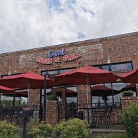 Outside of building. Outdoor seating only available when weather is good!😄 at Umi Sushi & Grill in Grand Rapids