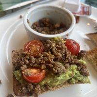 Avocado toast with impossible burger on it. Heinz 57 mixed into impossible Burger to add flavor    at Vacation Cafe in Nassau