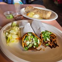 Phenomenal quesabirria and birria tacos made with oyster mushrooms. Served with some yummy pickled cabbage at Pokez in San Diego