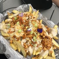 Tofu cheese fries  at Rúkula Vegan Food in Malaga