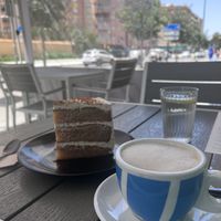 Lotus cookie cake & cappuccino   at Rúkula Vegan Food in Malaga