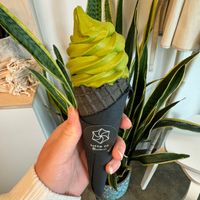 matcha soft serve in a cone   at Softie & Co in Vancouver