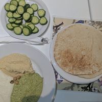 Dip trio with cucumbers and pita at Pita Jungle in Glendale