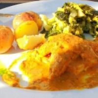 Tofu triangles with cardamom sauce. at Essencia in Porto