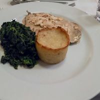 Main dish: saitan steak with almond topping, spinach and potato at Essencia in Porto