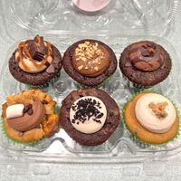 The flavors we ordered top down, left to right: Peanut Butter Cup, Hazelnut, Triple Chocolate, Smores, Cookies n Cream, Chocolate Chip Cookie Dough THEY WERE AMAZING!
 at veegmyeats in Bloomfield