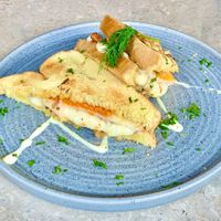 Melted cheese, bacon and eggs toastie. 100% Vegan.   at Beach Bowl Seminyak in Seminyak