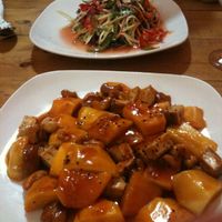 Cashew, mango, tofu in my plate ; salad in my friend's plate. 3-4$ dollars for each at Cafe Soleil in Phnom Penh