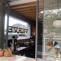 The coffee shop has huge glass windows  at Verve Coffee - Kamakura Yukinoshita in Kamakura