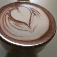 Dark Hot chocolate with oat milk. Perfect at Café Lumos in Cologne