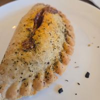 Meatball hand pie 🍕 at Seawall Coffee Company in Galveston