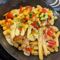 Chicken loaded fries at Veg Stop in Riga