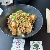 Tofu bowls with stickers that we received😄 at Veg Stop in Riga