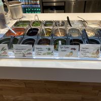 Choose your fillings and sauces  at Posh Potatoes in Hamburg