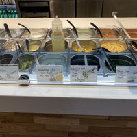 Choose your fillings and sauces  at Posh Potatoes in Hamburg