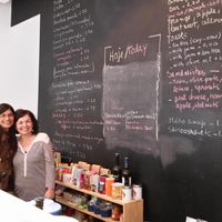 The lovely owner and staff member at Quintal Bioshop in Porto