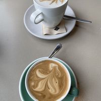 Flat white (yum!) with oat milk and a vanilla soy latte, also yum!  at Columbus Coffee in Greymouth