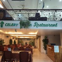 BE AWARE!! This restaurant is NOT FULLY VEGAN any longer, as you can see, they have covered the vegan part of the sign with some plants, and now they also serve death animals.  at Celery Vegan Restaurant in Cat Ba