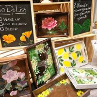 Hand painted serving trays for sale at Hella Plants Market in Oakland