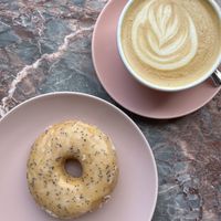 Lemon poppy seed donut und Cappuccino   at Brammibal's Donuts - Jungfernstieg in Hamburg