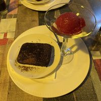 Chocolate Brownie with a frozen strawberry sauce  at Vegan e Meet in Johannesburg