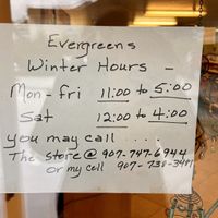 Opening times.  at Evergreen Natural Foods in Sitka