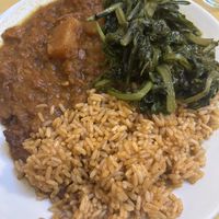 seitan goulash served with paprika rice and sautéed Swiss chard  at Il Vegetariano in Florence