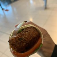 Falafel wrap. Pretty tasty but pricey    at SYD - Soul Origin - T2  in Mascot