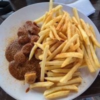 Vegan currywurst and fries at Kantine West in Freiburg