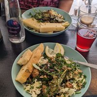 Roasted cauliflower salad with vegan toast. A glass of delicious kombucha /berry tea as well. at Grumpy Mamas in Monchique
