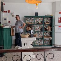 Looking up to the front counter and wall at Grumpy Mamas in Monchique