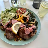 Plate of the day - sweet potato with black beans, chard, side salad  at Grumpy Mamas in Monchique