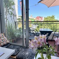 View out to the balcony seats and Monchique  at Grumpy Mamas in Monchique