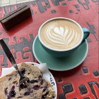 vegan blueberry cake + oat latte  at Caffènation in Amsterdam