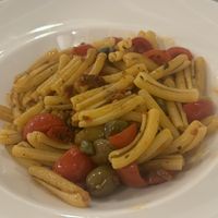 Pasta with cherry tomato, olives and capers   at Sale Amore e Vento in Salina