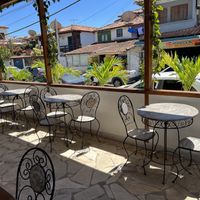 Outside seating  at Caverna in Armacao Dos Buzios