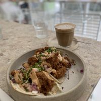 “Chickn” oyster mushroom tacos and soy latte.    at Palm Springs in Burleigh Heads