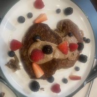 Vegan & gf pancakes with almond butter, berries and some agave syrup   at Osom in Madrid