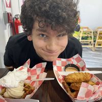 My son with his vegan chicken and waffle + vegan ice cream waffle  at Grandma's Ice Cream & Waffles in Rockville