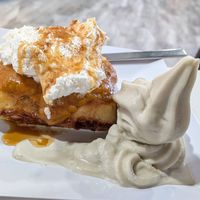 Pumpkin waffle with whipped cream, caramel sauce, and an added side of soft-serve vanilla - fully vegan! at Grandma's Ice Cream & Waffles in Rockville