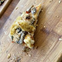 The last slice of my vegan pizza!   at La Plaza in Malaga