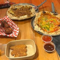 "chicken" curry pizza, sausage and pepper pizza, "chicken" strips and cauliflower bites 😋 at Pings in Kilmarnock