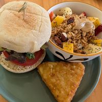"egg muffin" served with hash brown and fruit granola bowl at PURALMA Vegan Bakery in San Jose