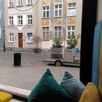 Cozy seating by the window at Balans Kawy Speciality & Bajgiel in Gdansk