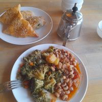 Pumpkin and spinach samosas and beans with broccoli at Do'stlar in Tashkent