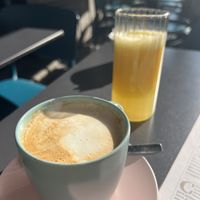 Cappuccino di soia e spremuta  at Long Song Books & Café in Milan