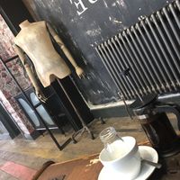 Coffee and oat milk   at The Junkyard in Newcastle Upon Tyne