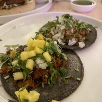 Chili burger in the back. Chicharrón and pastor tacos   at The Forward Thinking Eatery in San Jose Del Cabo