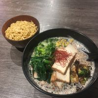 Tonyu Ramen with sesame seeds and extra noodles  at Kotsu Ramen & Gyoza in Redondo Beach
