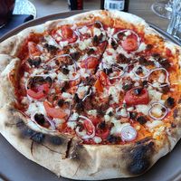 Custom pizza with vegan chorizo at Totale Pizzeria - Saldanha in Lisbon
